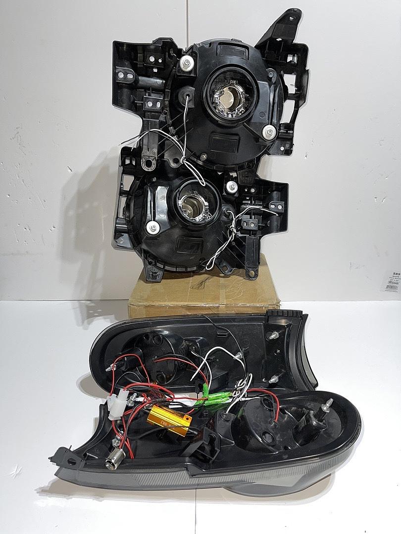 DNA Motoring - Faros delanteros de lente ahumado con LED DRL + luz direccional secuencial