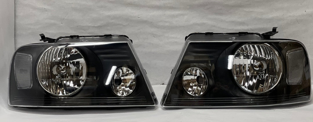 04-08 Ford F-150 black housing headlights