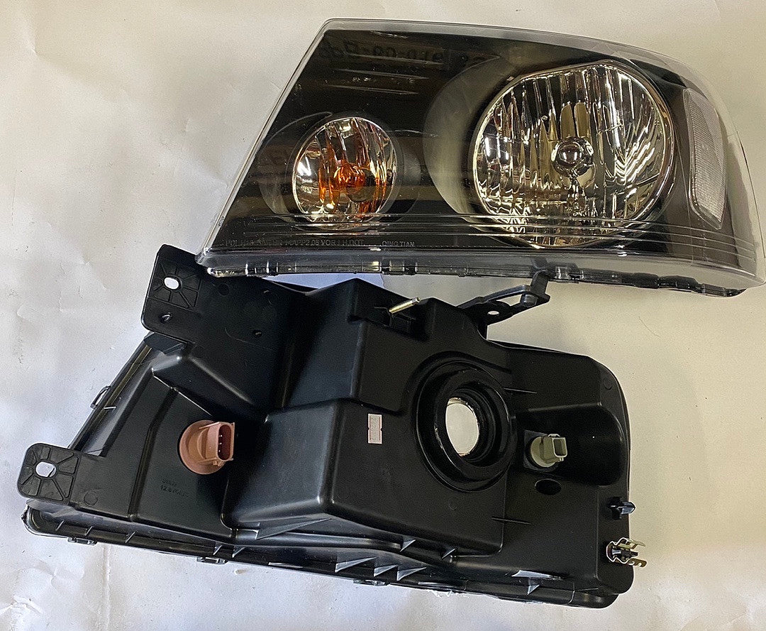 04-08 Ford F-150 black housing headlights