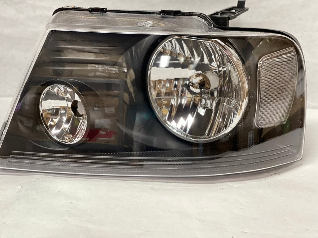 04-08 Ford F-150 black housing headlights