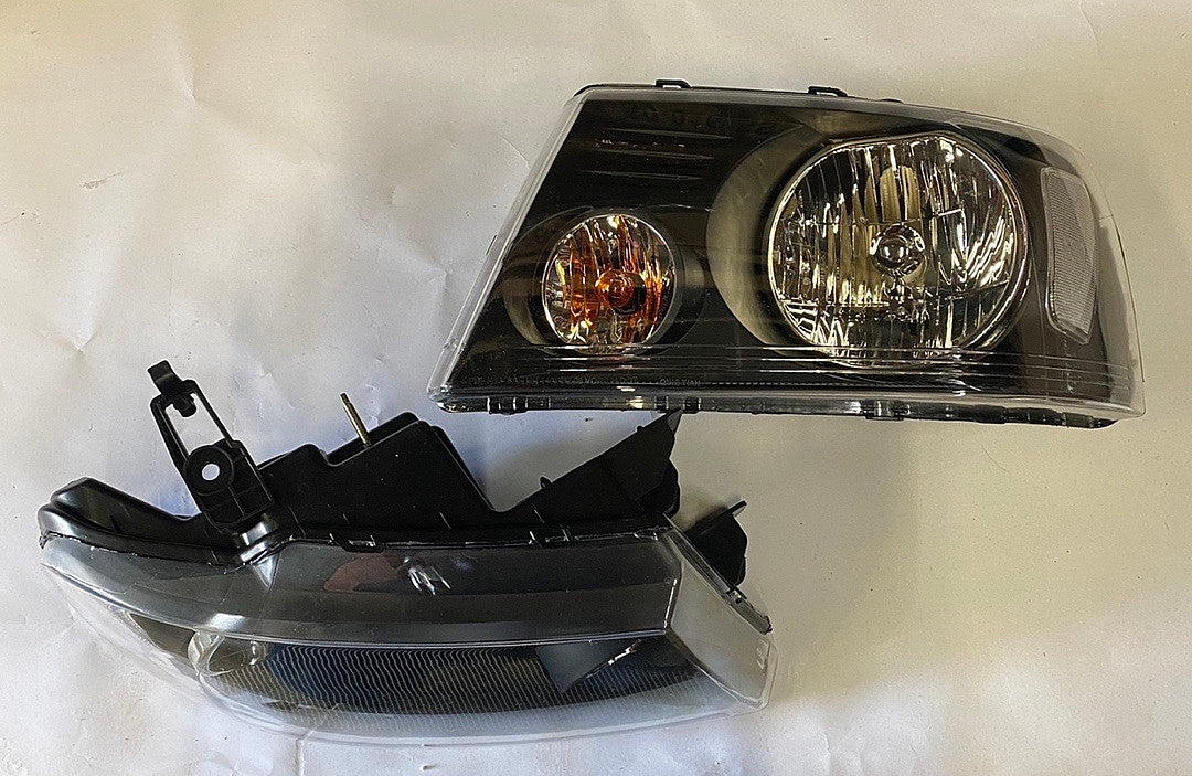 04-08 Ford F-150 black housing headlights