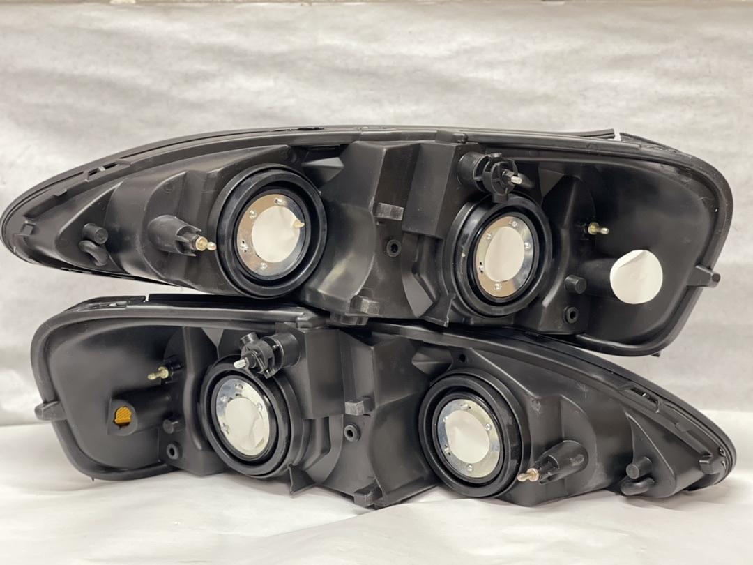 Pontiac Grand Prix Black Housing Headlights for 2004 to 2008