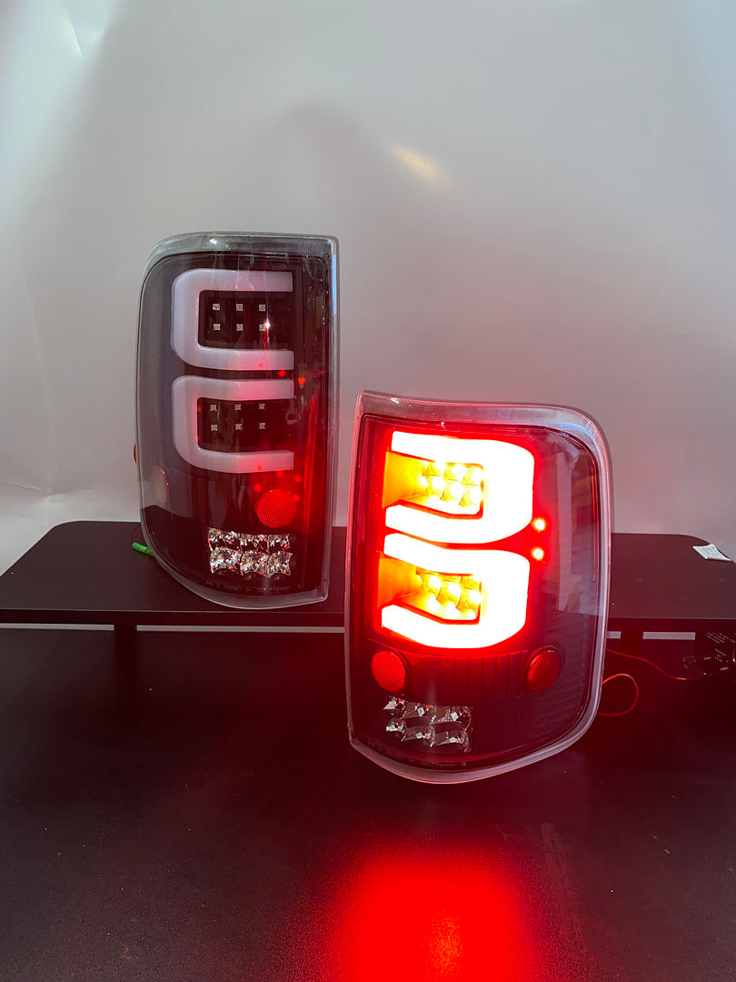 04-08 FORD F-150 / LOBO BLACK HOUSING AND CLEAR C-style LED TAIL LIGHTS -