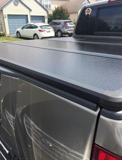 Pickup Truck Bed Top Hard Solid Tri-Fold Tonneau Cover Compatible with 2004-2015 Titan 6.7Ft Fleetside / Styleside Bed