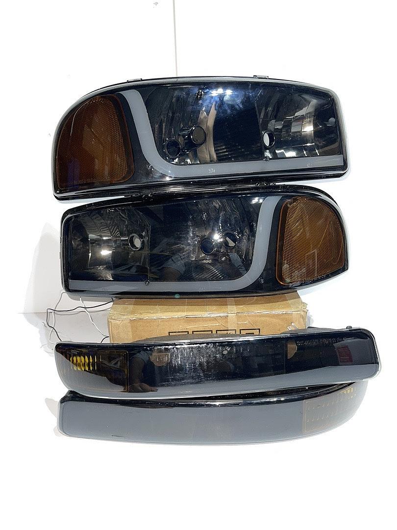 99-06 Gmc Sierra / Yukon Smoked Amber headlights G1