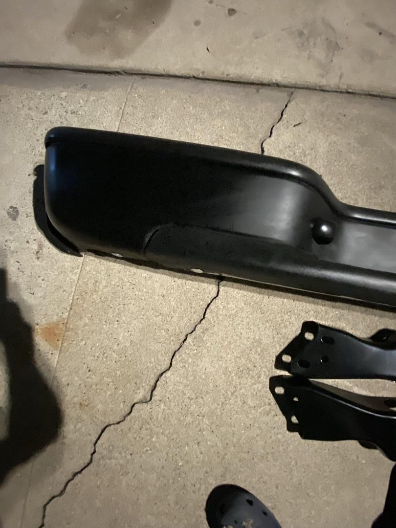 99-06 Chevy Silverado / Gmc Sierra rear black bumper with brackets and complete hardware new new