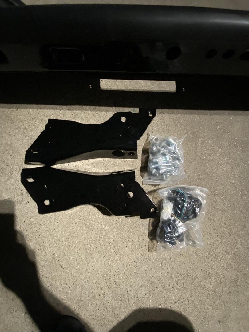99-06 Chevy Silverado / Gmc Sierra rear black bumper with brackets and complete hardware new new