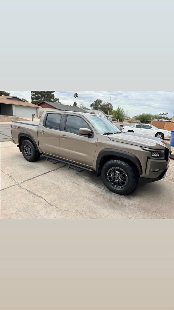 05-24 Nissan frontier Black textured off road running boards crew cab