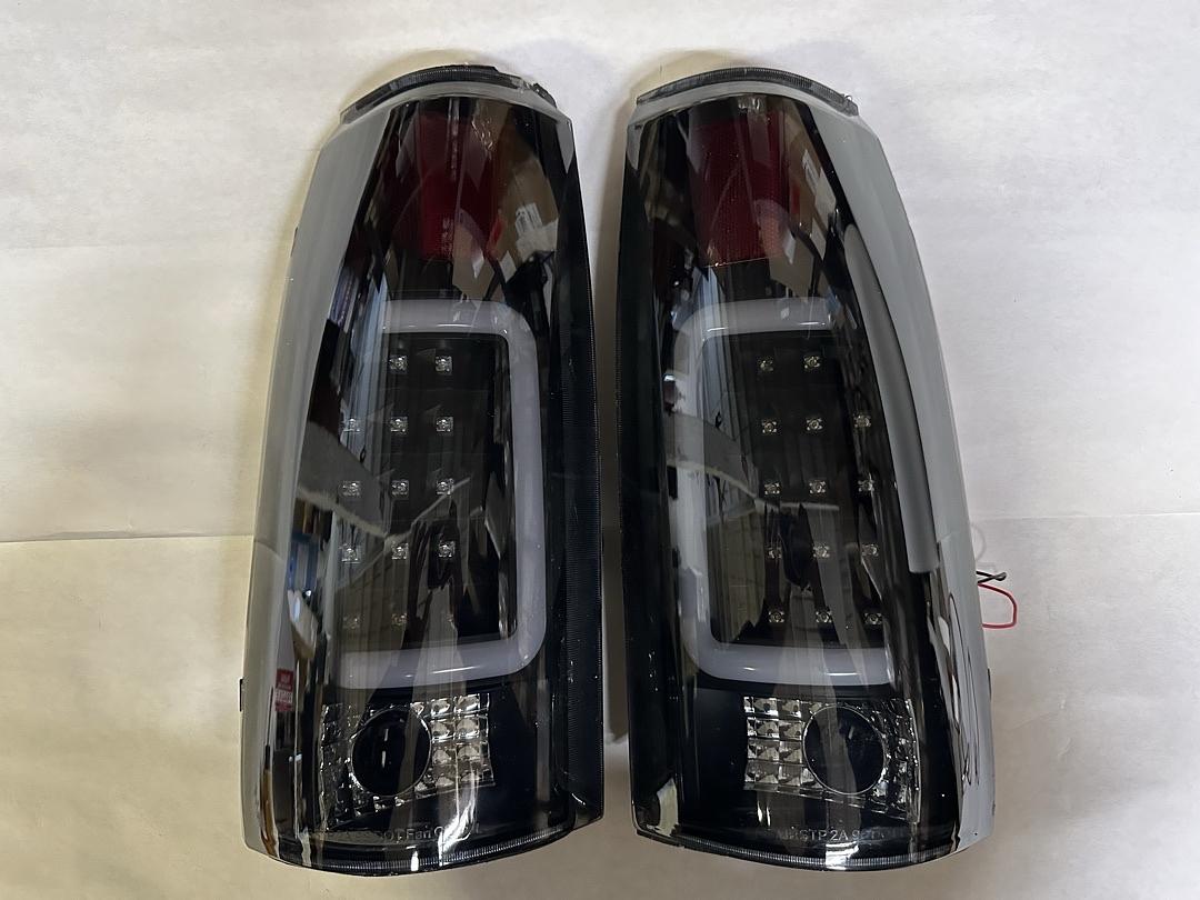 OB TL-C10-LED-3D-BK-SM 88-02 Chevy GMC C/K Series Smoked Lens LED Taillights Chipped (left side)
