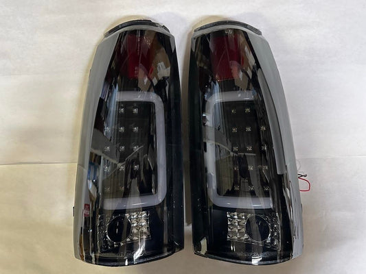 OB TL-C10-LED-3D-BK-SM 88-02 Chevy GMC C/K Series Smoked Lens LED Taillights Chipped (left side)
