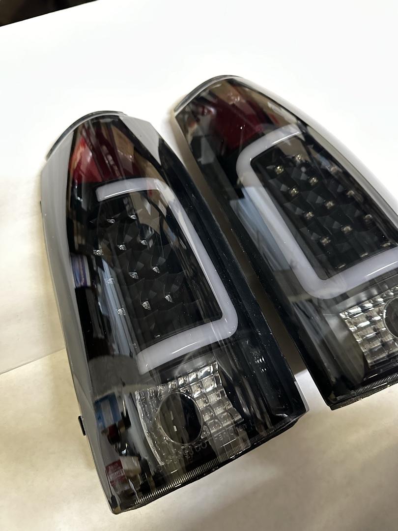 OB TL-C10-LED-3D-BK-SM 88-02 Chevy GMC C/K Series Smoked Lens LED Taillights Chipped (left side)