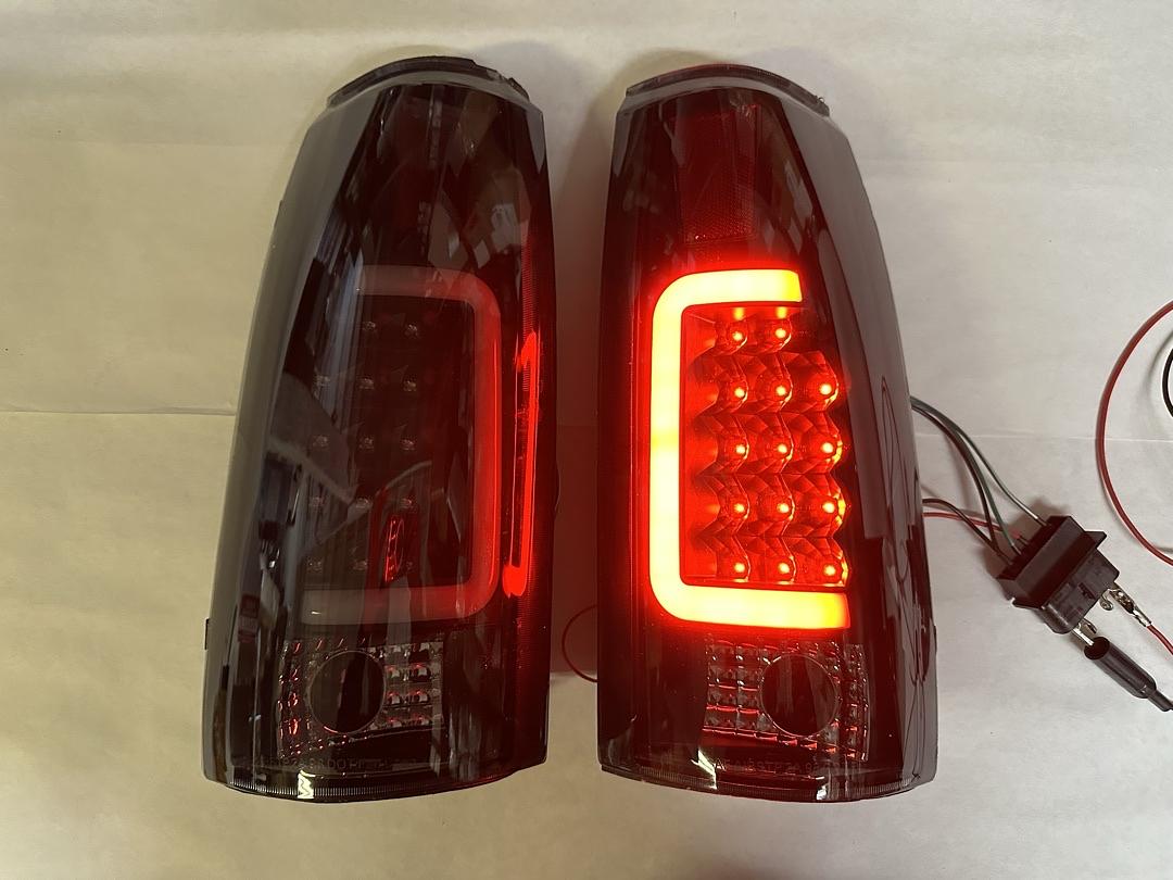 OB TL-C10-LED-3D-BK-SM 88-02 Chevy GMC C/K Series Smoked Lens LED Taillights Chipped (left side)