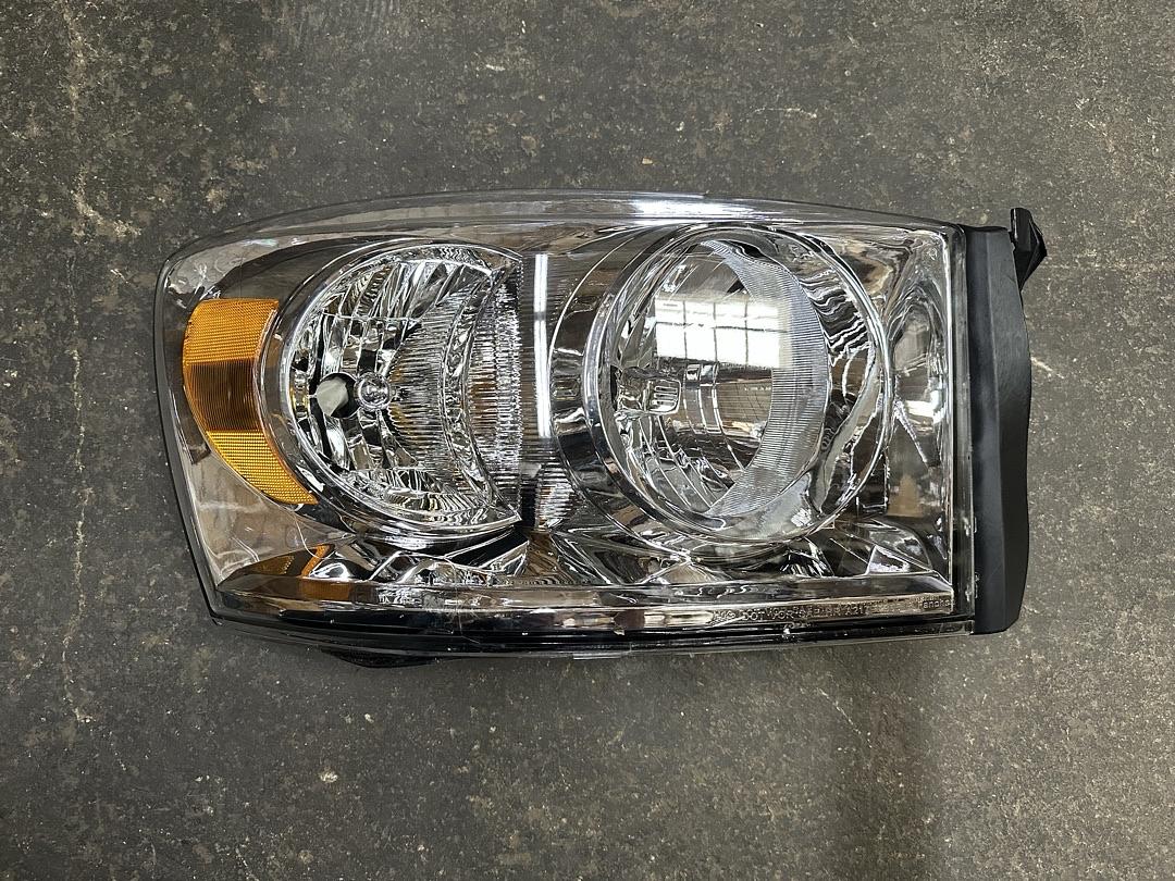 As Is 06-08 Dodge Ram Right Side/ Passenger Side Headlight Chrome Amber