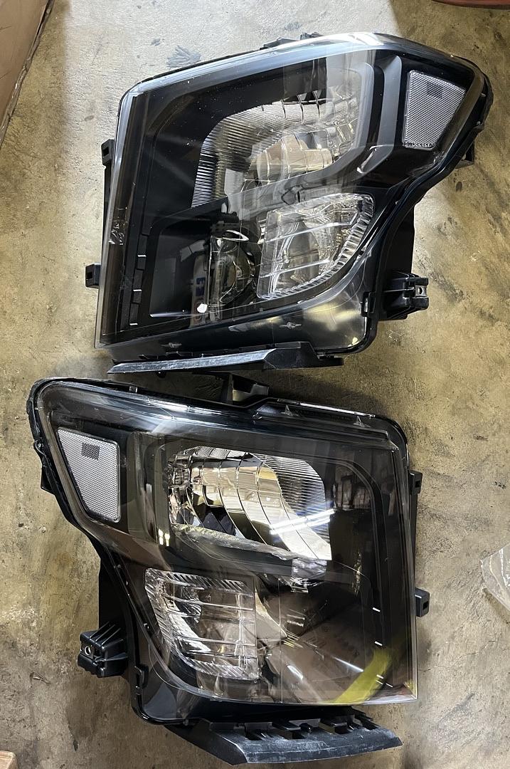 Pair of Factory Headlights Compatible with 17-22 Titan / 16-22 Titan XD Black/Clear