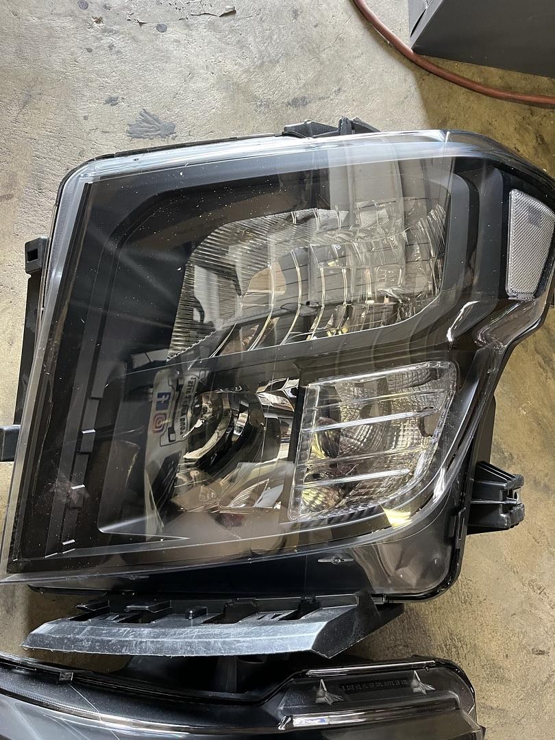 Pair of Factory Headlights Compatible with 17-22 Titan / 16-22 Titan XD Black/Clear