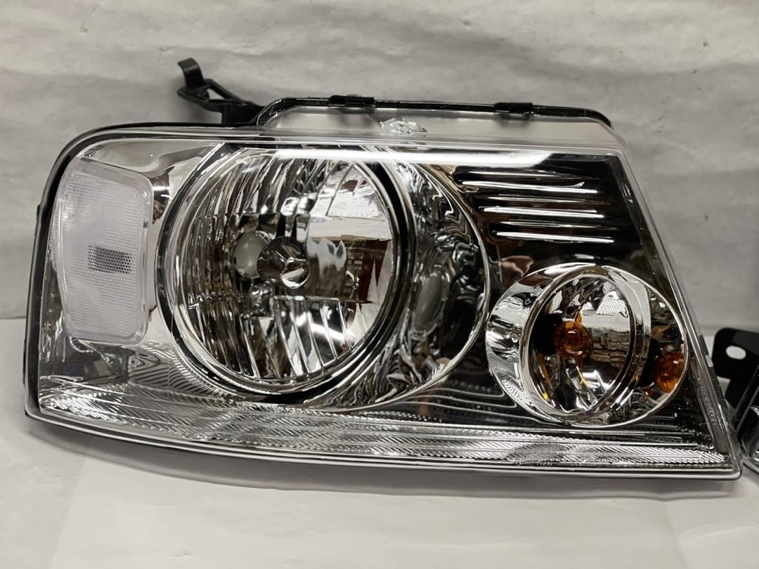 04-08 Ford F-150 06-08 Lincoln Mark LT chrome housing and clear headlights