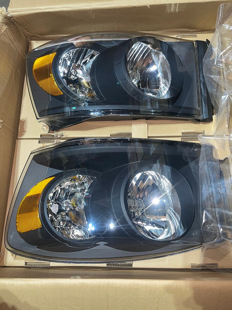HL-OH-RM06-BK-AM. Dodge Ram Black Housing Headlights for 2006 to 2008.