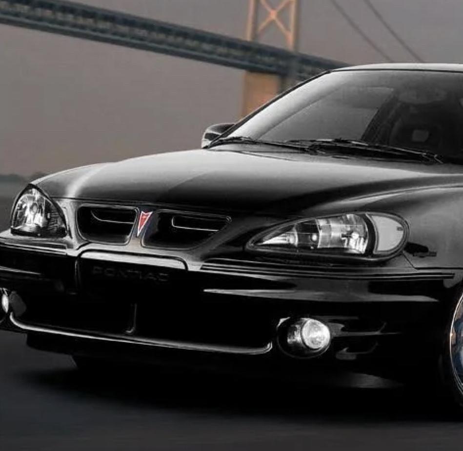 Pontiac Grand Am Black Housing Headlights Clear Reflectors for 1999 to 2004