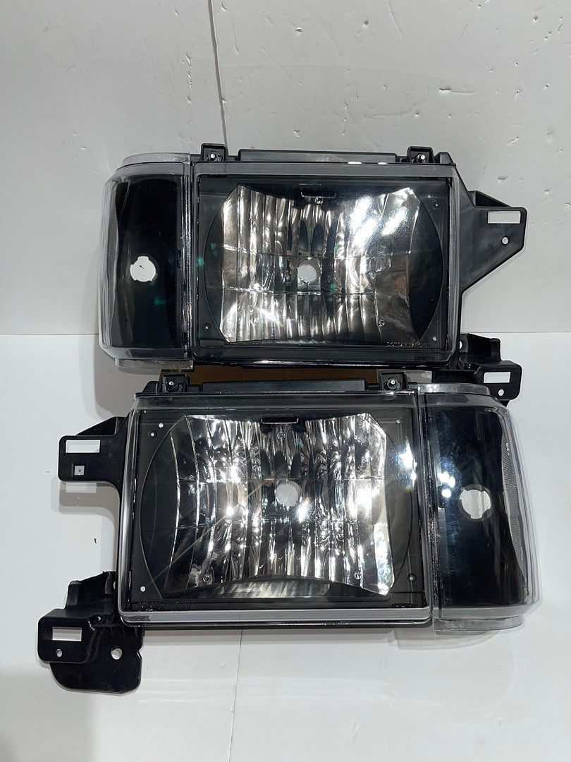87-91 Ford F-150 / F-250/ F-350 / Bronco Blackhousing Headlights