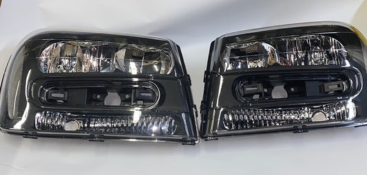 02-09 chevy trailblazer black housing headlights