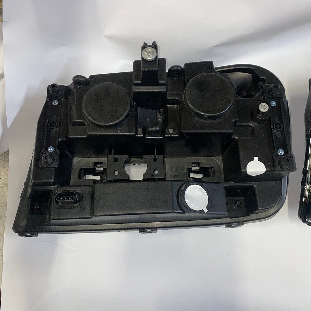 02-09 chevy trailblazer black housing headlights