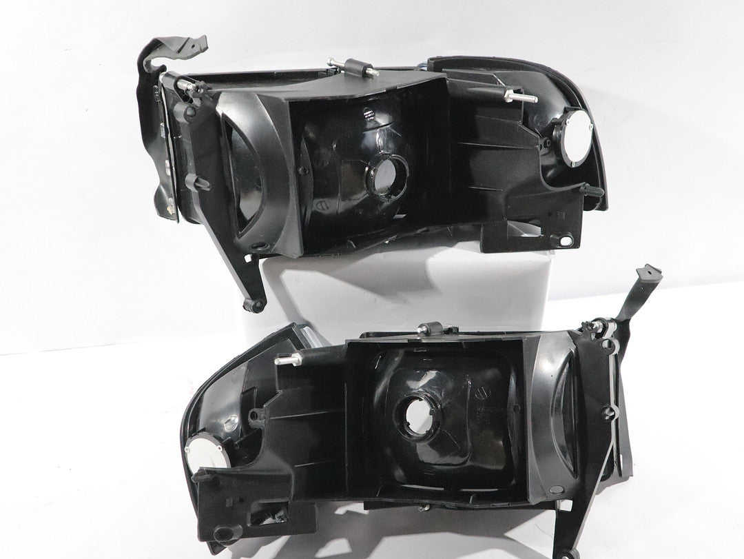 (Refurbish) (R) OH-DR944P-BK-AM 94-01 DODGE RAM 1500 94-02 RAM 2500 3500 BLACK AMBER HEADLIGHT
