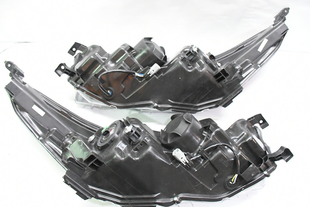 14-16 Toyota Highlander black housing and clear with amber projector headlights