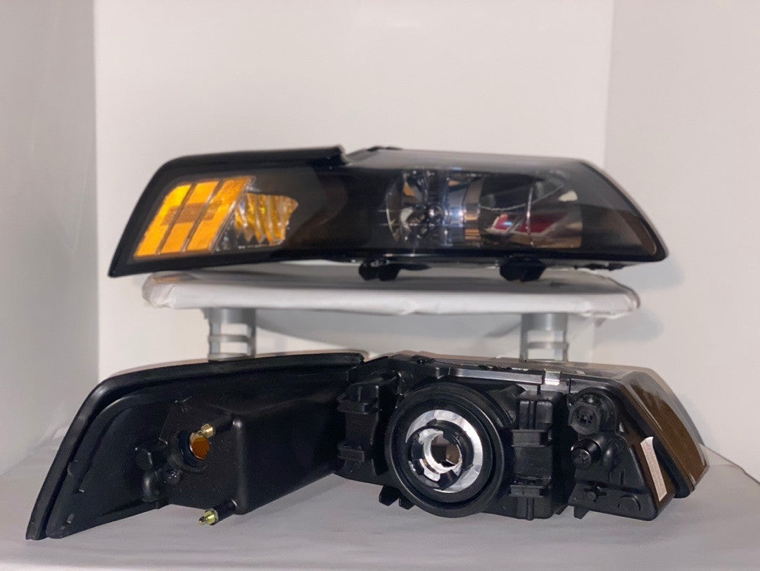 99-04 Ford Mustang Black housing / clear reflectors