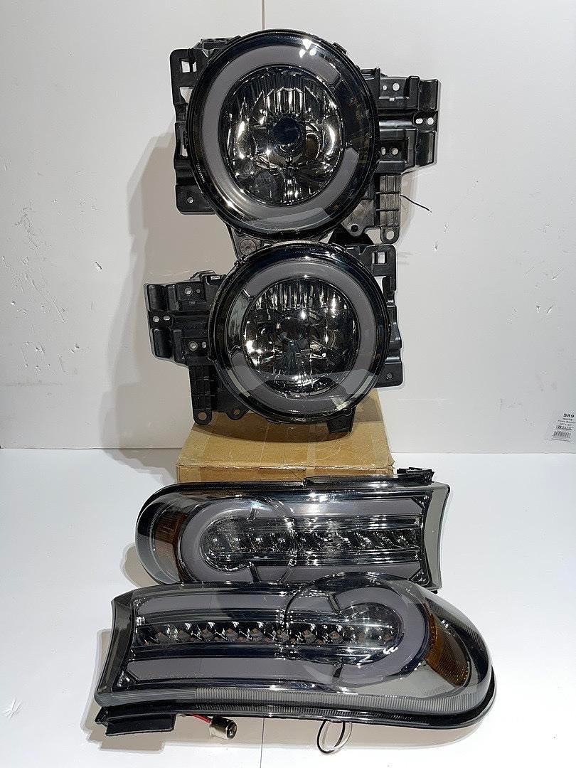 DNA Motoring - Faros delanteros de lente ahumado con LED DRL + luz direccional secuencial